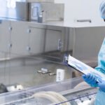researcher-inspects-device-150x150